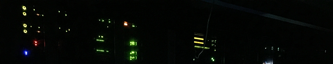 Console meter lights in a dark rack.